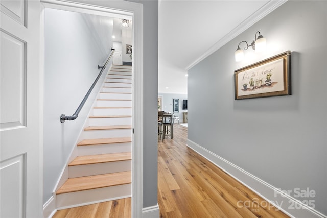184 Quiet Cove Rd, Mooresville, NC 28117 - stairs featuring ornamental molding, wood finished floors, baseboards, and recessed lighting