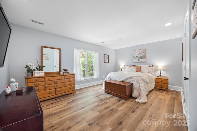184 Quiet Cove Rd, Mooresville, NC 28117 - bedroom with light wood-style floors, baseboards, and recessed lighting