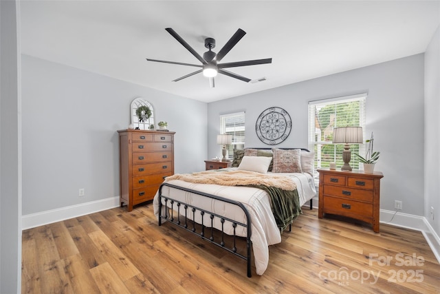 184 Quiet Cove Rd, Mooresville, NC 28117 - bedroom featuring light wood finished floors, baseboards, and ceiling fan