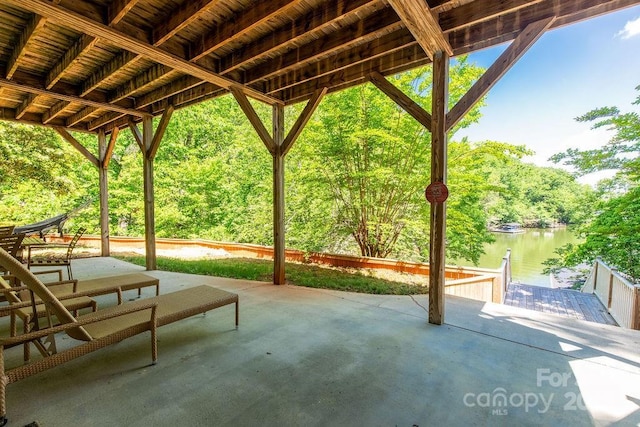 46827 Tall Whit Rd, New London, NC 28127 - view of patio featuring a water view and a boat dock