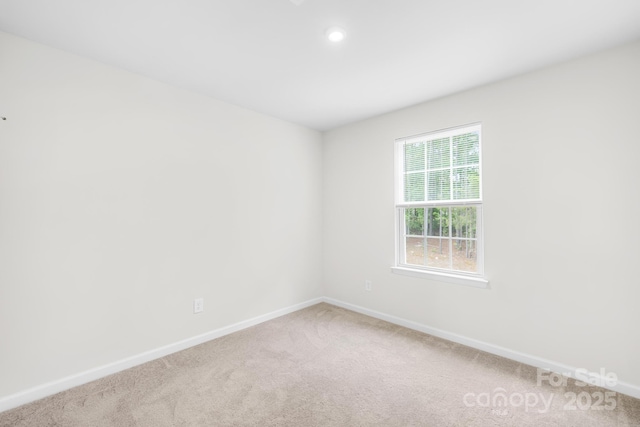 2012 Slippery Rock Ln, Monroe, NC 28112 - carpeted spare room featuring baseboards and recessed lighting