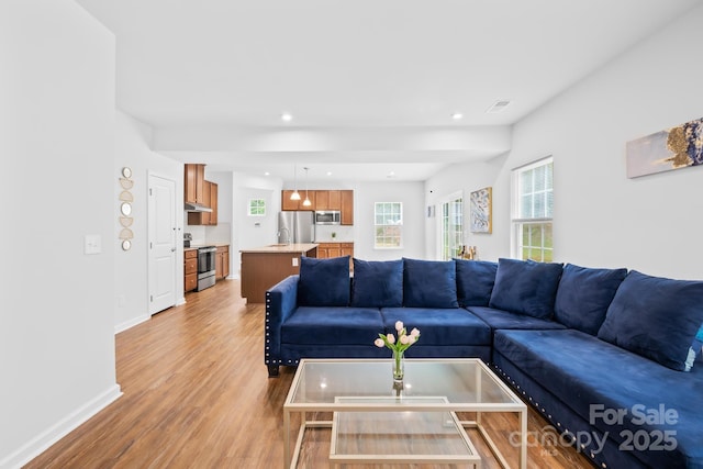 2012 Slippery Rock Ln, Monroe, NC 28112 - living area with light wood-style floors, baseboards, and recessed lighting
