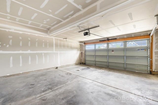 2012 Slippery Rock Ln, Monroe, NC 28112 - garage featuring a garage door opener