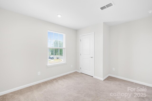 2012 Slippery Rock Ln, Monroe, NC 28112 - spare room with light colored carpet and baseboards