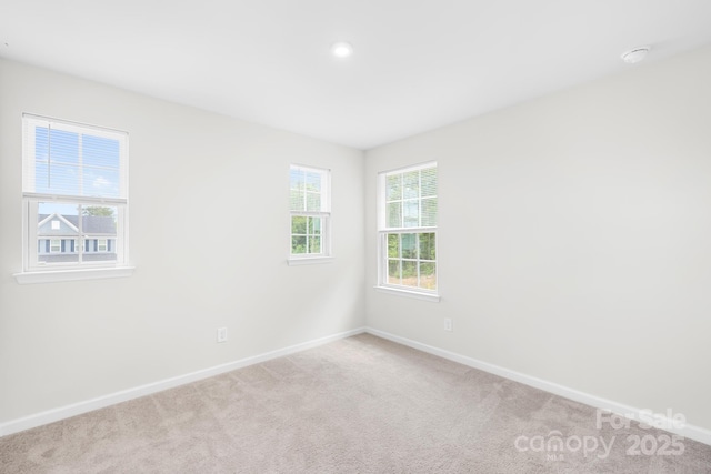 2012 Slippery Rock Ln, Monroe, NC 28112 - unfurnished room with baseboards and light colored carpet
