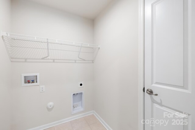 2012 Slippery Rock Ln, Monroe, NC 28112 - washroom featuring hookup for a washing machine, baseboards, electric dryer hookup, gas dryer hookup, and light tile patterned flooring
