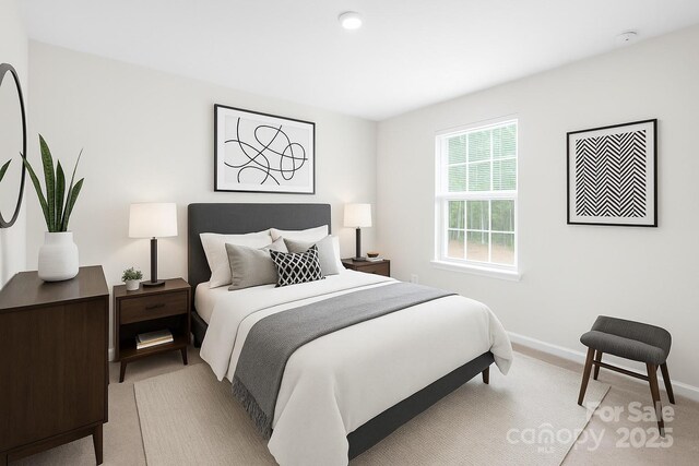 2012 Slippery Rock Ln, Monroe, NC 28112 - bedroom featuring light colored carpet and baseboards