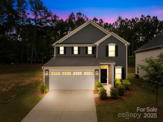 2012 Slippery Rock Ln, Monroe, NC 28112 - view of front of property featuring driveway, an attached garage, and a lawn