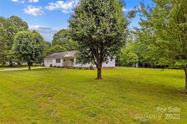 115 Three Oaks Ln, Statesville, NC 28677 - view of front of home featuring a garage, a front yard, and driveway