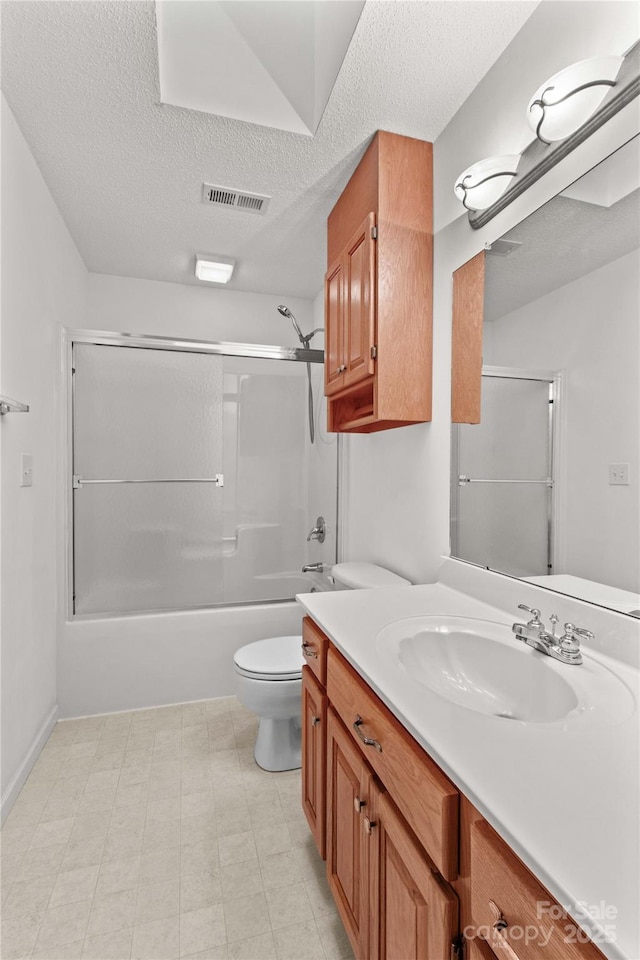 115 Three Oaks Ln, Statesville, NC 28677 - bathroom with vanity, a textured ceiling, toilet, and shower / tub combination