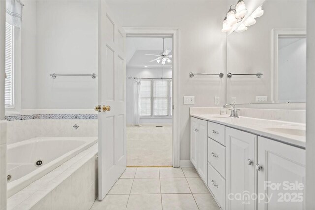 600 Robinhood Dr, Cheraw, SC 29520 - full bathroom featuring ceiling fan, a sink, tile patterned floors, double vanity, and a tub with jets