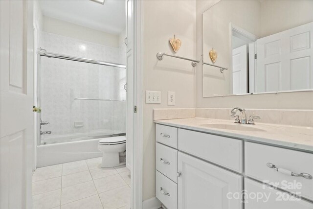 600 Robinhood Dr, Cheraw, SC 29520 - bathroom featuring tile patterned flooring, toilet, bathing tub / shower combination, and vanity