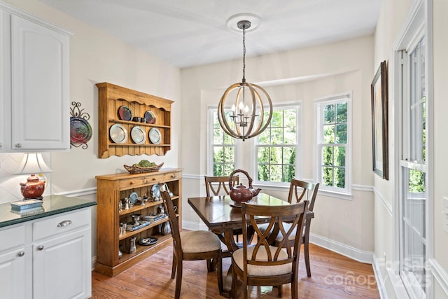 216 Cold Stream Way, Hendersonville, NC 28791 - dining area featuring baseboards, a notable chandelier, and light wood-style floors