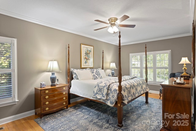 216 Cold Stream Way, Hendersonville, NC 28791 - bedroom with baseboards, crown molding, a ceiling fan, and wood finished floors