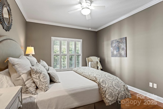 216 Cold Stream Way, Hendersonville, NC 28791 - bedroom with crown molding, baseboards, ceiling fan, and wood finished floors