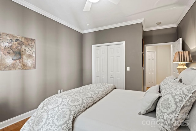 216 Cold Stream Way, Hendersonville, NC 28791 - bedroom with wood finished floors, a ceiling fan, a closet, crown molding, and baseboards