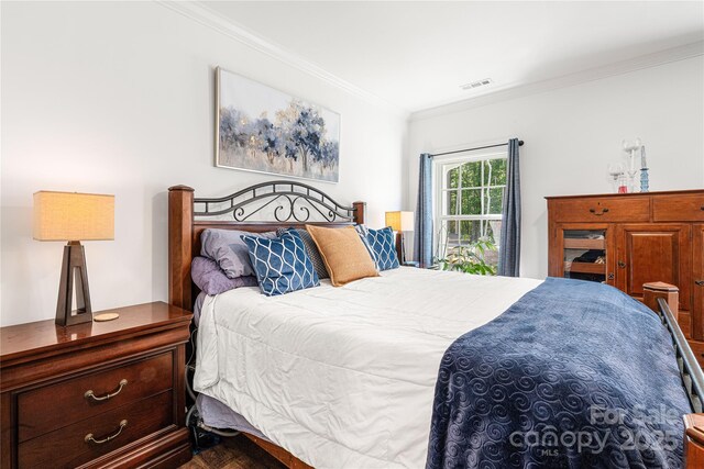 bedroom featuring ornamental molding
