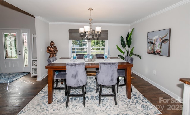 dining area with a chandelier, crown molding, baseboards, and dark wood-style flooring