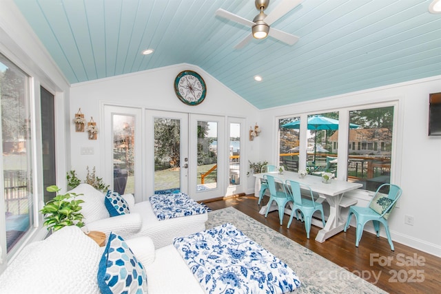 sunroom / solarium featuring french doors