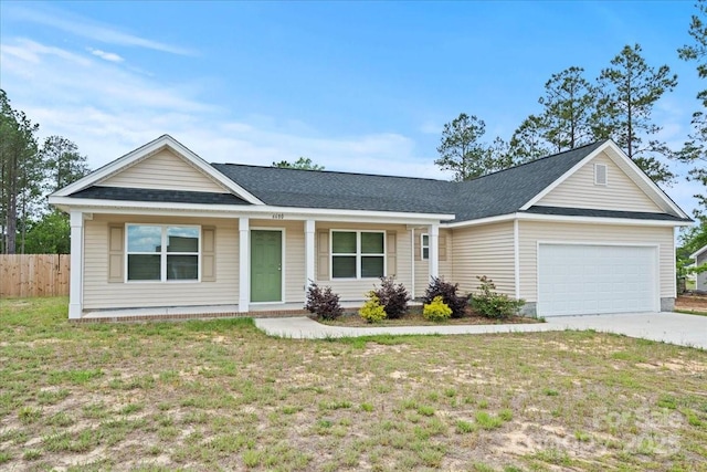 single story home featuring a garage, concrete driveway, covered porch, and roof with shingles
