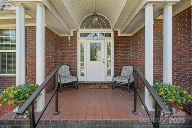 14340 Kendalton Meadow Dr, Mint Hill, NC 28227 - doorway to property featuring a porch and brick siding