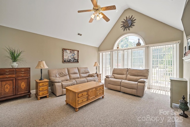 14340 Kendalton Meadow Dr, Mint Hill, NC 28227 - living area featuring light colored carpet, ceiling fan, and high vaulted ceiling