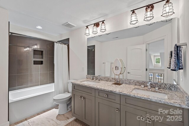 112 Nautilus Ct, Troutman, NC 28166 - full bath featuring toilet, double vanity, shower / bath combination with curtain, and recessed lighting