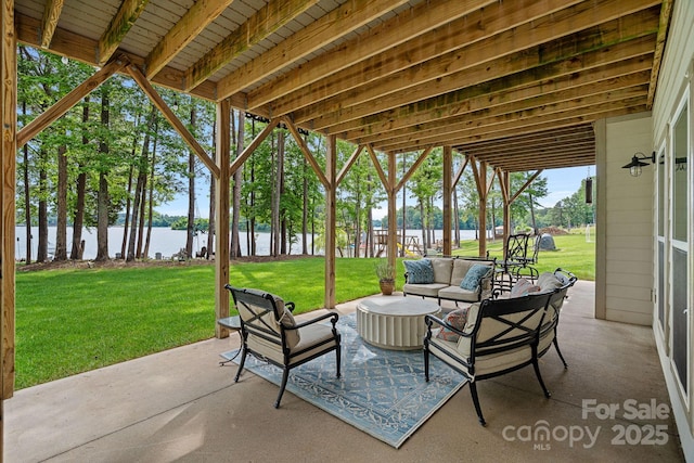 112 Nautilus Ct, Troutman, NC 28166 - view of patio / terrace with a water view and an outdoor living space