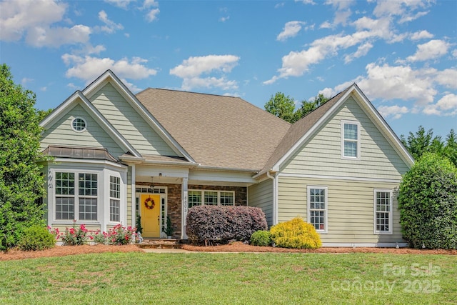 6603 Havencrest Dr, Denver, NC 28037 - view of front facade with a front yard and a shingled roof