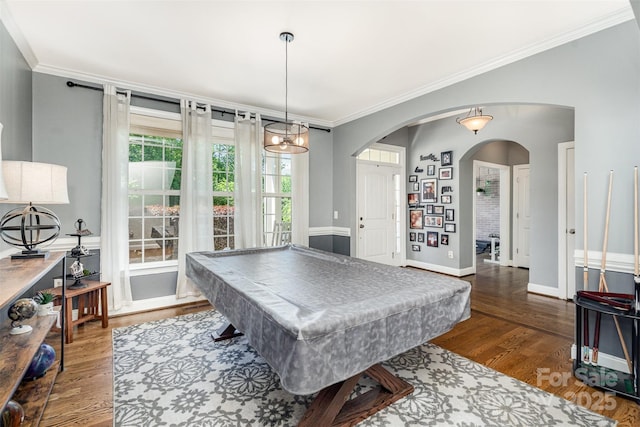 6603 Havencrest Dr, Denver, NC 28037 - rec room featuring crown molding, wood finished floors, arched walkways, and baseboards