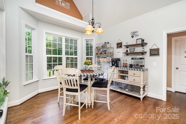 6603 Havencrest Dr, Denver, NC 28037 - dining room with a chandelier, lofted ceiling, wood finished floors, and baseboards