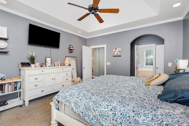 6603 Havencrest Dr, Denver, NC 28037 - carpeted bedroom featuring arched walkways, a tray ceiling, recessed lighting, crown molding, and connected bathroom