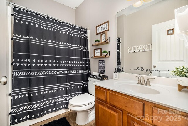 6603 Havencrest Dr, Denver, NC 28037 - full bathroom featuring tile patterned floors, toilet, vanity, and a shower with shower curtain