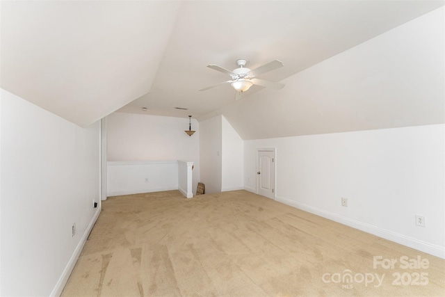 6603 Havencrest Dr, Denver, NC 28037 - additional living space with lofted ceiling, ceiling fan, and light colored carpet