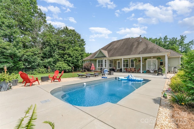 6603 Havencrest Dr, Denver, NC 28037 - outdoor pool featuring a patio area and an outdoor fire pit