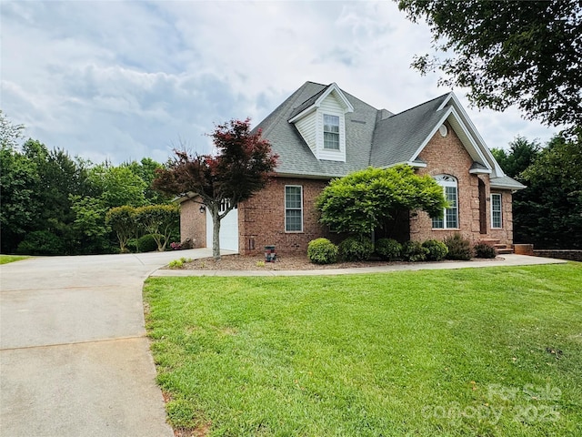 5518 Land Harbour Dr, Granite Falls, NC 28630 - view of front of property featuring roof with shingles, concrete driveway, a front lawn, and brick siding
