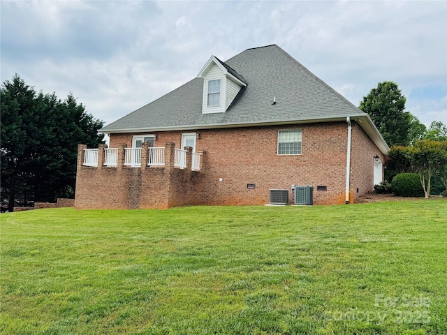 5518 Land Harbour Dr, Granite Falls, NC 28630 - rear view of house featuring a yard, brick siding, central AC, and a shingled roof