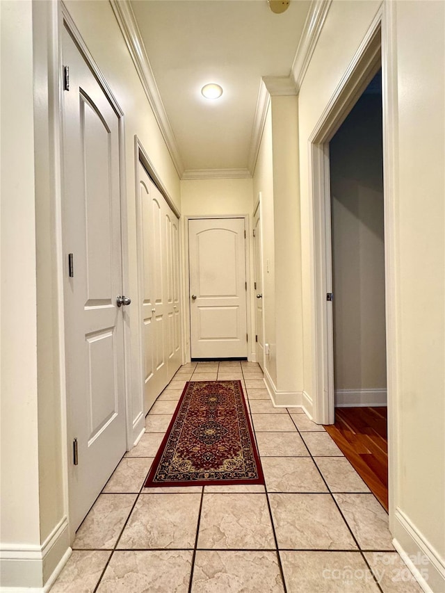 5518 Land Harbour Dr, Granite Falls, NC 28630 - hall featuring crown molding, light tile patterned flooring, and baseboards