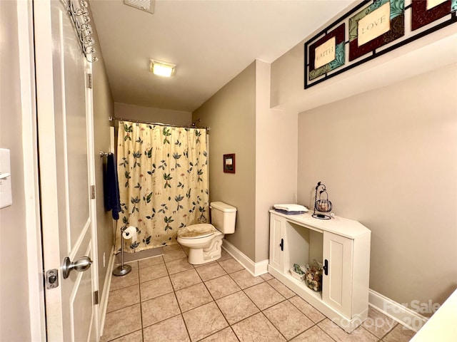 5518 Land Harbour Dr, Granite Falls, NC 28630 - full bath featuring tile patterned flooring, toilet, a shower with shower curtain, baseboards, and visible vents