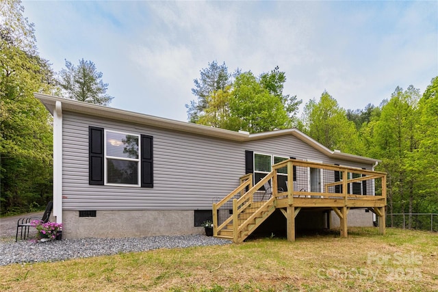 71 Austin Dr, Marshall, NC 28753 - back of property with a wooden deck, crawl space, and stairway