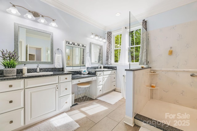 full bath with walk in shower, crown molding, tile patterned flooring, and vanity