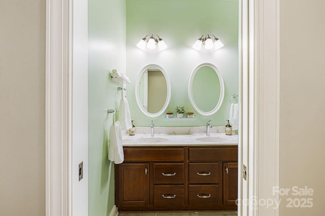 full bath featuring double vanity and a sink