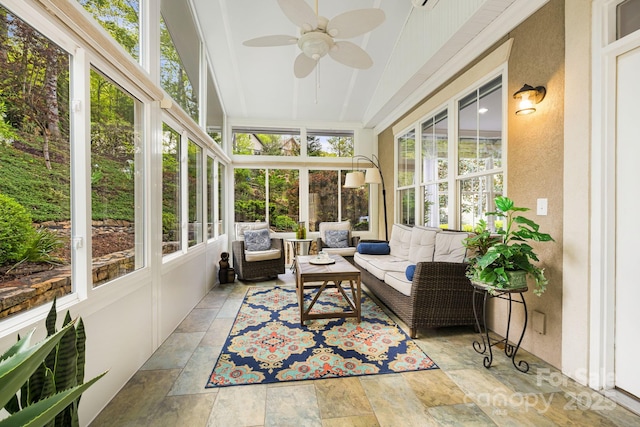 sunroom / solarium featuring outdoor lounge area and a ceiling fan