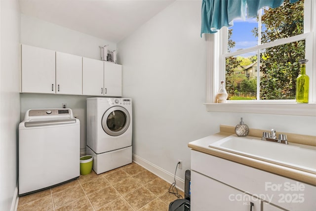 14 Larue Ct, Biltmore Lake, NC 28715 - laundry area with cabinet space, independent washer and dryer, and baseboards