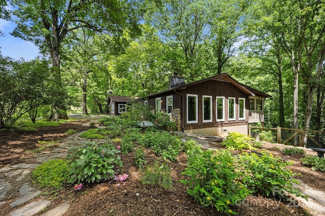1128 Forest St, Mars Hill, NC 28754 - back of house with a chimney and an outbuilding