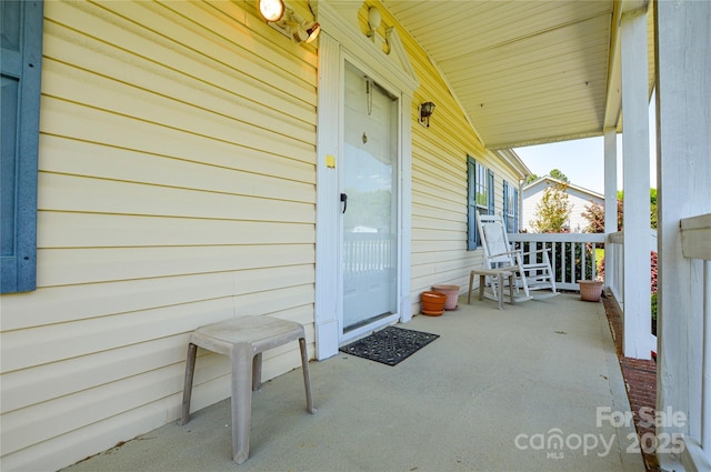 entrance to property with a porch