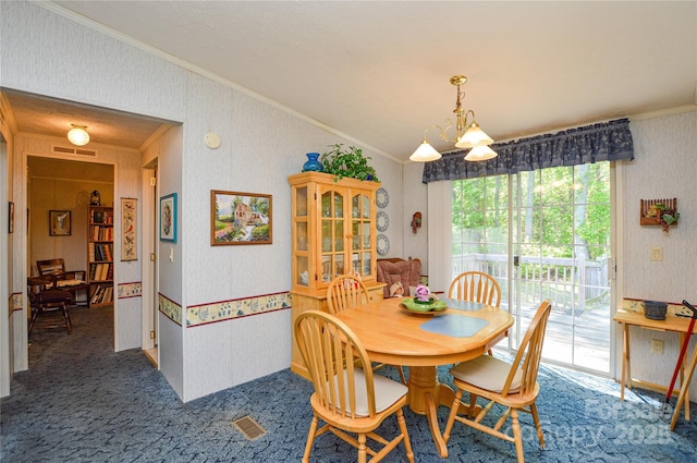 carpeted dining space with vaulted ceiling, crown molding, wallpapered walls, and visible vents