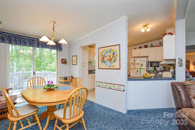 dining space with light carpet, an inviting chandelier, lofted ceiling, and ornamental molding