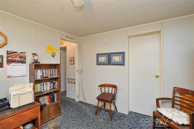 living area featuring crown molding, a textured ceiling, visible vents, and carpet floors