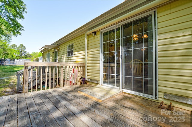 wooden terrace with fence